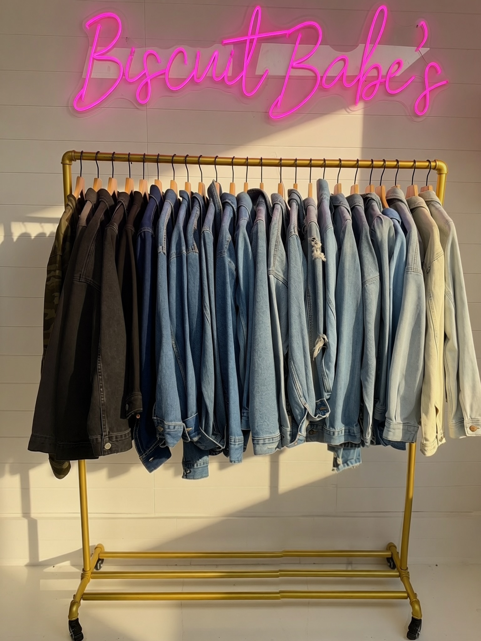 Biscuit Babe's neon sign with denim jacket collection